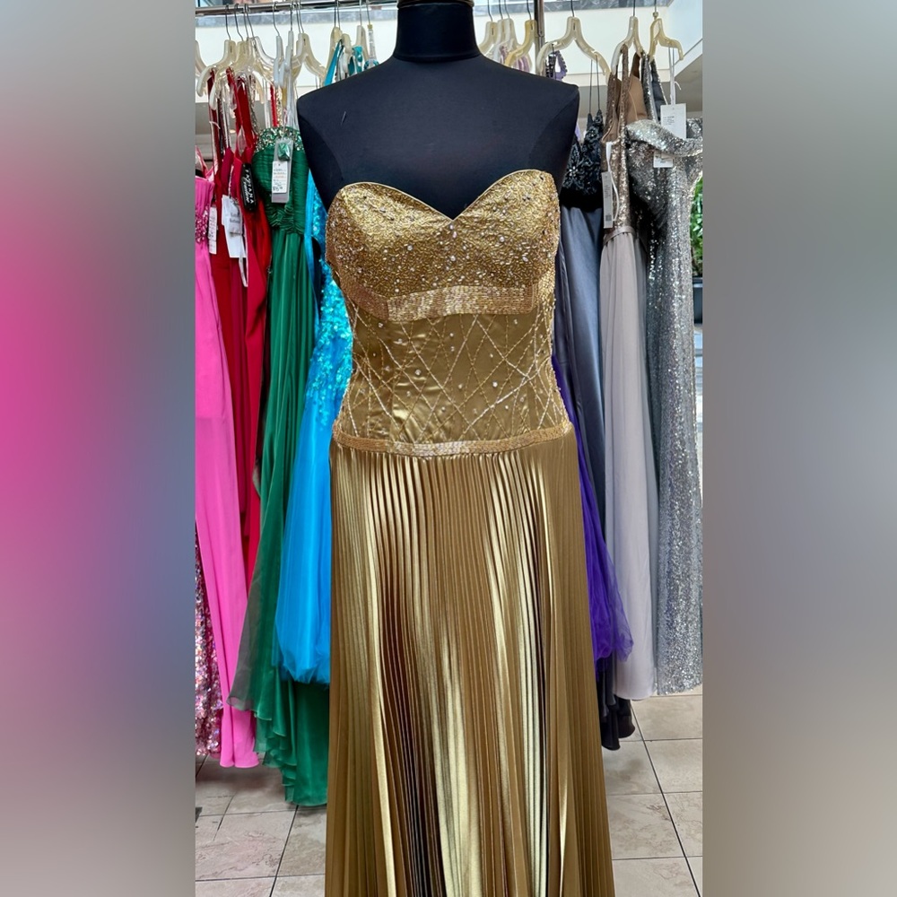 Brand new evening gown. Gold full length gown. Riva style #7105